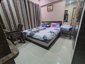 Bedroom in 2 BHK Apartment at Raunak Sai Dham Towers, Kandivali West – for Rent