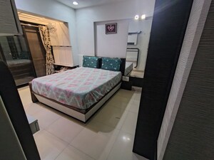 Bedroom in 2 BHK Apartment at Raunak Sai Dham Towers, Kandivali West – for Rent