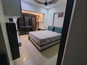 Bedroom in 2 BHK Apartment at Raunak Sai Dham Towers, Kandivali West – for Rent