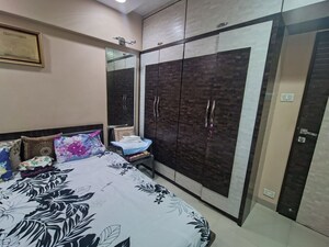 Bedroom in 2 BHK Apartment at Raunak Sai Dham Towers, Kandivali West – for Rent