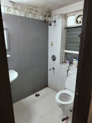 Bathroom in 2 BHK Apartment at South City Garden, B L Saha Road – for Rent
