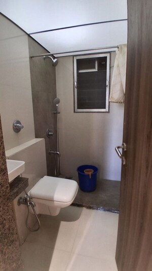 Bathroom in 2 BHK Apartment at Harasiddh Viraaj, Malad East – for Rent