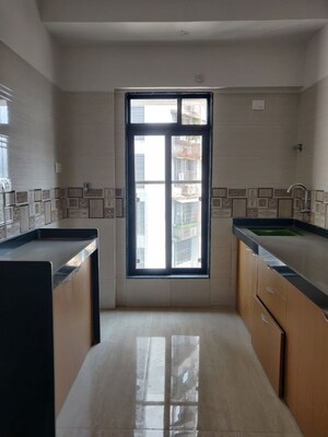 Kitchen in 2 BHK Apartment at Vrindavan ABC CHS, Malad East – for Rent