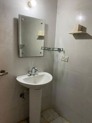 Bathroom in 3 BHK Builder Floor at Ansal Sushant Shopping Arcade, Sector 27 – for Rent