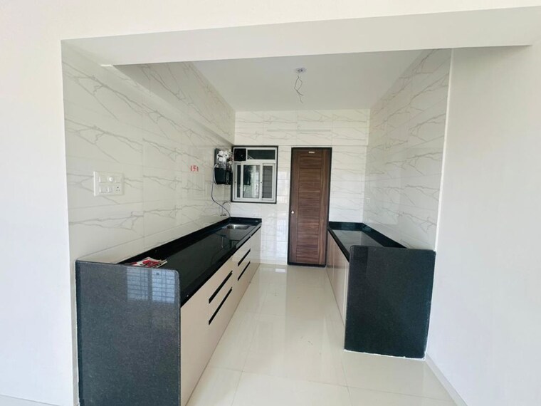 Kitchen, veddant-ganesh-bella-rossa-phase-2 3 Bedroom 993 Sq.Ft. Apartment In Punawale Pune 10263789