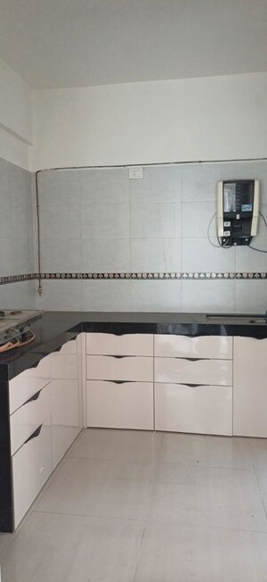 Kitchen in 2.5 BHK Apartment at Pharande Celestial City, Ravet – for Rent
