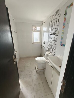 Bathroom in 4 BHK Apartment at Gulshan Vivante, Sector 137 – for Sale