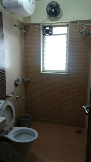 Bathroom in 3 BHK Apartment at The Wadhwa Anmol Pride, Goregaon West – for Rent
