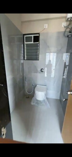 Bathroom in 2.5 BHK Apartment at Haware Intelligentia Axis, Borivali East – for Rent