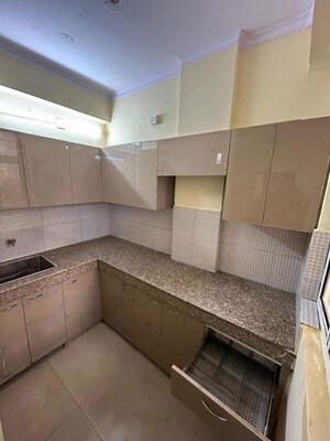 Kitchen in 2.5 BHK Apartment at Ajnara Ambrosia, Sector 118 – for Sale