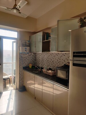 Kitchen in 2 BHK Apartment at Omkar Alta Monte, Malad East – for Rent