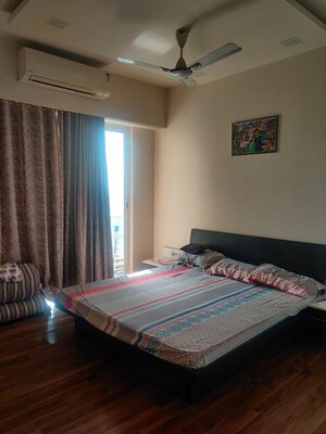 Bedroom in 2 BHK Apartment at Omkar Alta Monte, Malad East – for Rent