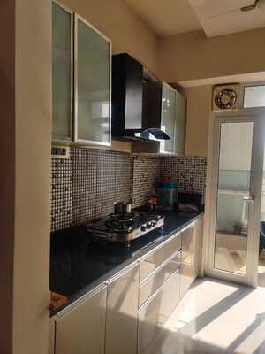 Kitchen in 2 BHK Apartment at Omkar Alta Monte, Malad East – for Rent