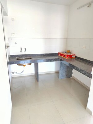 Kitchen in 1 BHK Apartment at Mantra Essence, Undri – for Rent