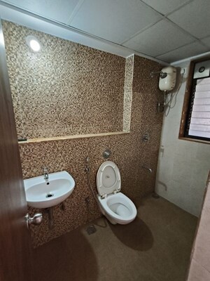 Bathroom in 1 BHK Apartment at Lodha Lakeshore Greens, Dombivli East – for Rent