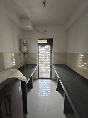 Kitchen in 1 BHK Apartment at Lodha Lakeshore Greens, Dombivli East – for Rent
