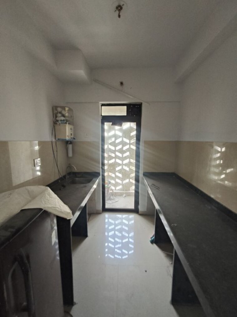 Kitchen, lodha-lakeshore-greens 1 Bedroom 505 Sq.Ft. Apartment In Dombivli East Thane 10264175