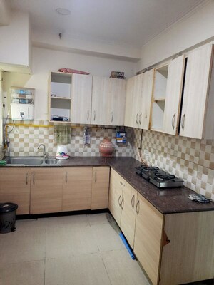 Kitchen in 2 BHK Apartment at Gaur City 6th Avenue, Sector 4 Greater Noida – for Rent