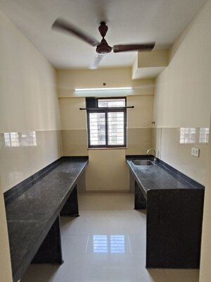 Kitchen in 1 BHK Apartment at Lodha Lakeshore Greens, Dombivli East – for Sale