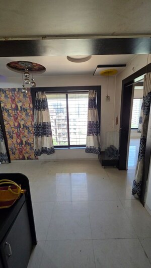 Living Room in 2 BHK Apartment at Global Serenity, Moshi – for Rent