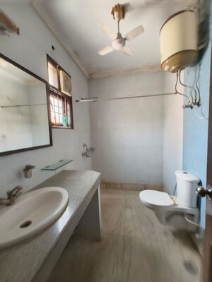 Bathroom in 4 BHK Builder Floor at Kalkaji – for Rent