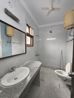 Bathroom in 4 BHK Builder Floor at Kalkaji – for Rent