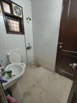 Bathroom in 4 BHK Builder Floor at Kalkaji – for Rent