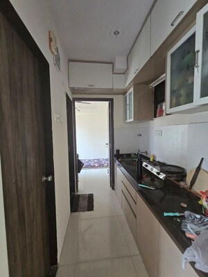 Kitchen in 1 BHK Apartment at Squarefeet Joy square, Kasarvadavali – for Sale