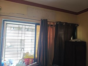 Living Room in 2 BHK Apartment at Dombivli East – for Rent