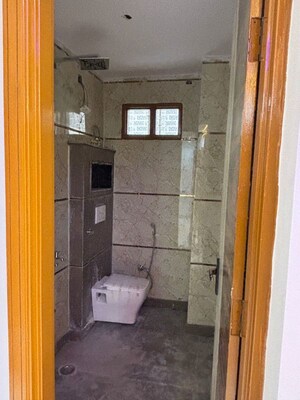 Bathroom in 3 BHK Builder Floor at Dwarka Mor – for Sale