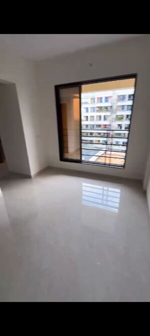 Living Room in 1 BHK Apartment at Manpada – for Sale