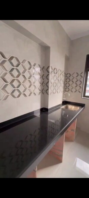 Kitchen in 1 BHK Apartment at Manpada – for Sale