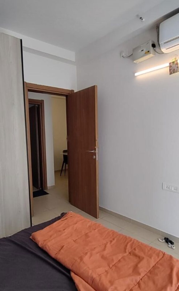 Bedroom, bhartiya-nikoo-homes 2.5 Bedroom 945 Sq.Ft. Apartment In Thanisandra Main Road Bangalore 10264855