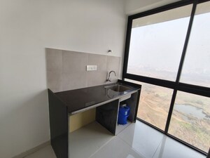 Kitchen in 1 BHK Apartment at Marathon Nextown, Dombivli East – for Rent