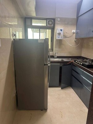 Kitchen in 2 BHK Apartment at Chandak Cornerstone, Worli – for Rent