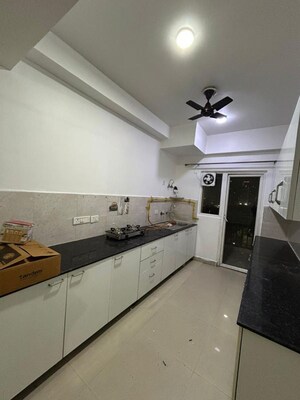 Kitchen in 3.5 BHK Apartment at Aims Golf Avenue I, Sector 75 – for Rent