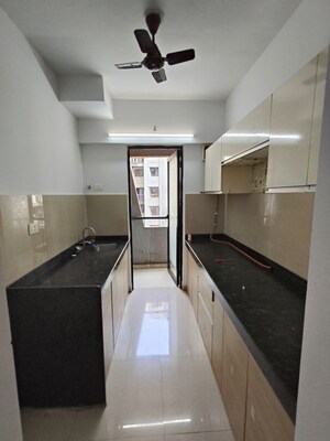 Kitchen in 2 BHK Apartment at Lodha Downtown, Dombivli East – for Sale