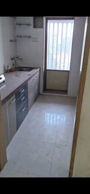 Kitchen in 3 BHK Apartment at Antariksh Apartment, Mira Road – for Rent