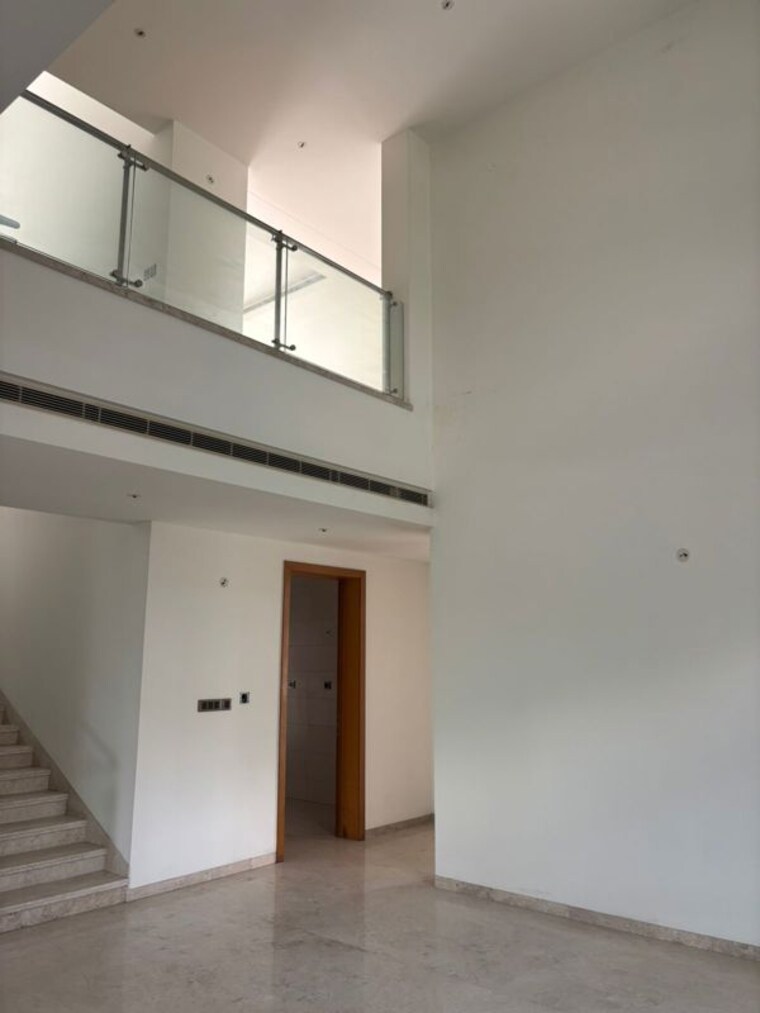 Living Room, unitech-uniworld-resorts-the-residences 5 Bedroom 6689 Sq.Ft. Villa In Sector 33 Gurgaon 10265337