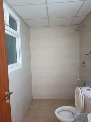 Bathroom in 2 BHK Apartment at Bhartiya City Nikoo Homes II, Thanisandra Main Road – for Rent