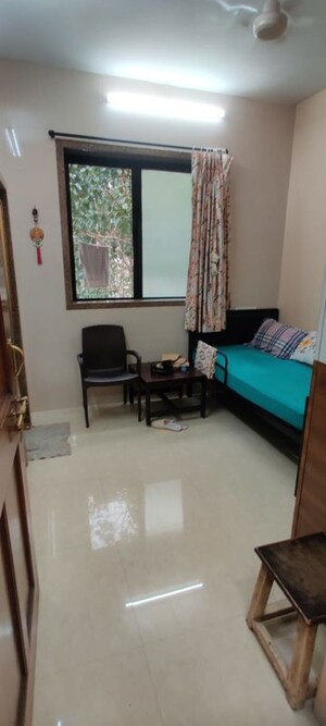 Living Room in 2 BHK Apartment at Kartar Bhavan, Colaba – for Sale