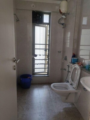 Bathroom in 2 BHK Apartment at Sheth Vasant Oasis, Andheri East – for Rent