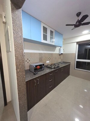Kitchen in 3 BHK Apartment at Tirath Apartment, Vile Parle West – for Rent