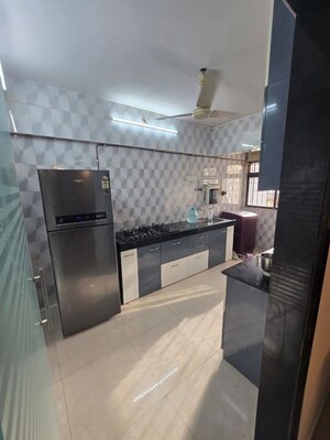 Kitchen in 3 BHK Apartment at Charmee Enclave, Vile Parle East – for Rent