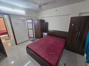 Bedroom in 3 BHK Apartment at Charmee Enclave, Vile Parle East – for Rent