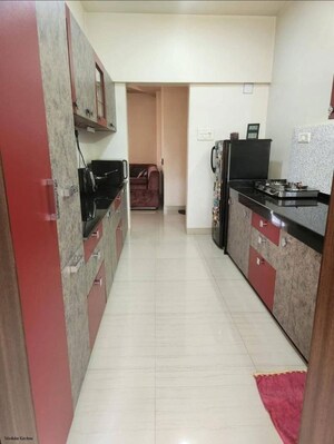Kitchen in 2 BHK Apartment at Kolte Patil Aleria, Kharadi – for Rent