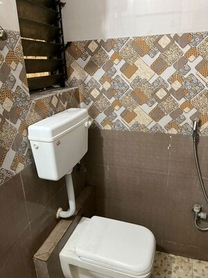 Bathroom in 1 BHK Apartment at Riddhi Gardens CHS, Malad East – for Rent