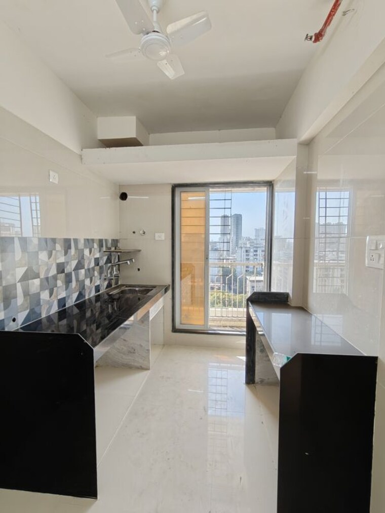 Kitchen, strawberry-the-address 2 Bedroom 1060 Sq.Ft. Apartment In Mira Road East Thane 10266313