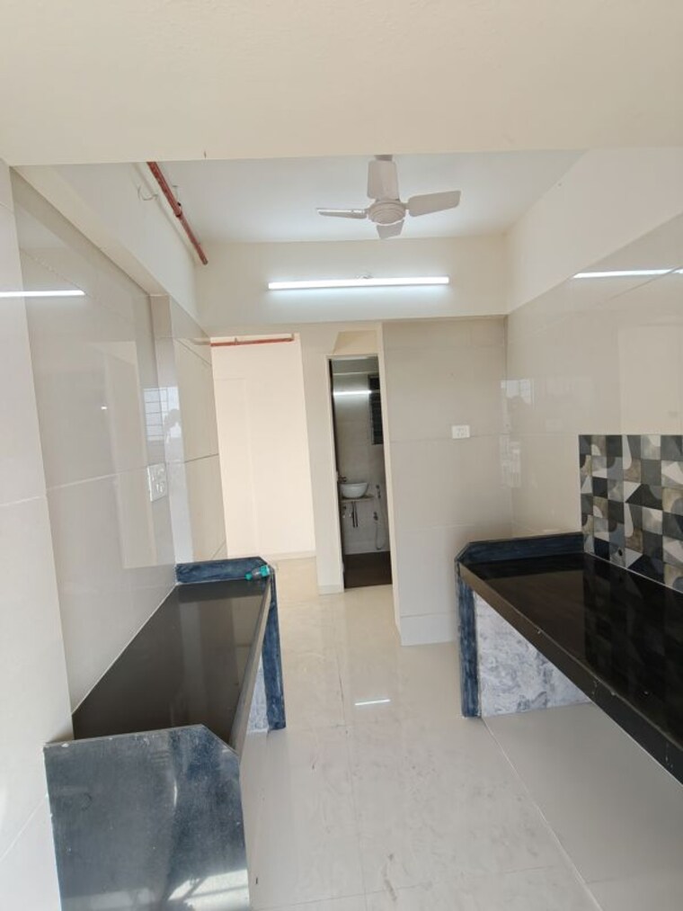 Kitchen, strawberry-the-address 2 Bedroom 1060 Sq.Ft. Apartment In Mira Road East Thane 10266313