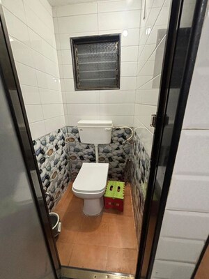 Bathroom in 1 RK Apartment at Nagari Niwara CHS, Goregaon East – for Rent